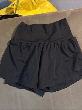 Black High/Wide Waistband Halara shorts with spandex underneath